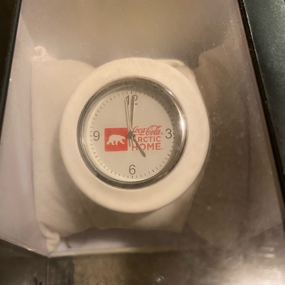 coca cola watch with rubber snap wristband.